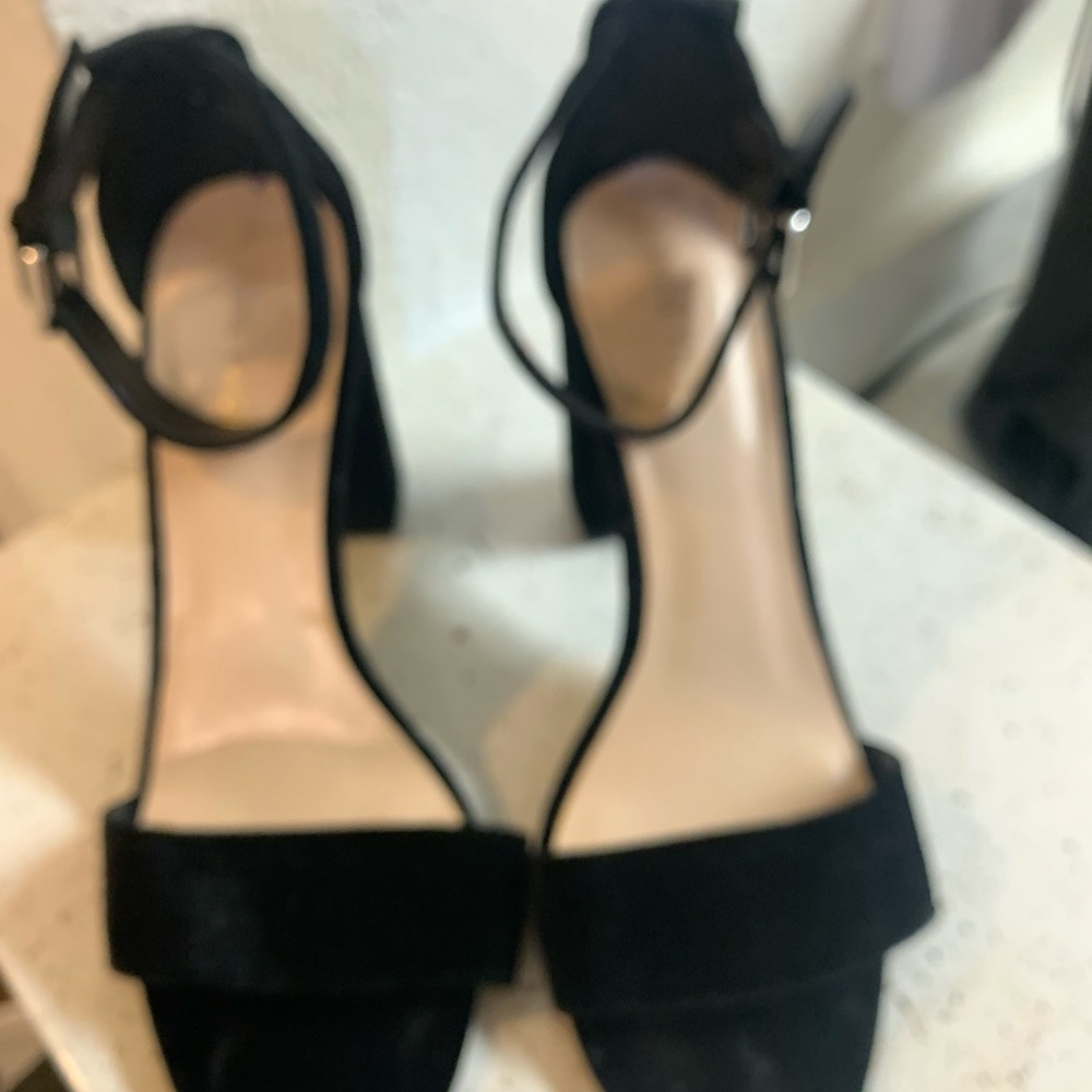 High heeled, black velvet shoes